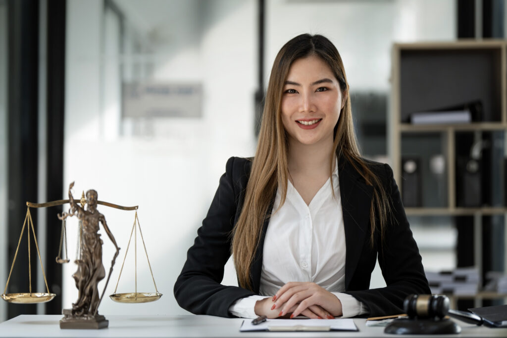 portrait of young female lawyer or attorney working in the offic