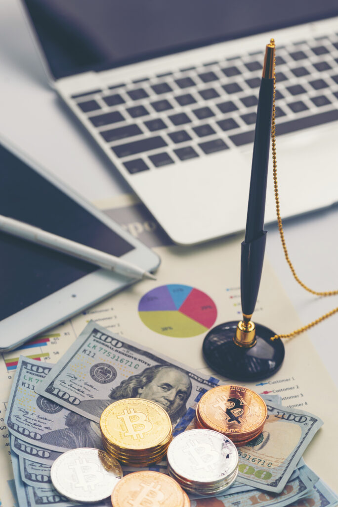 business success and money concept with bitcoins